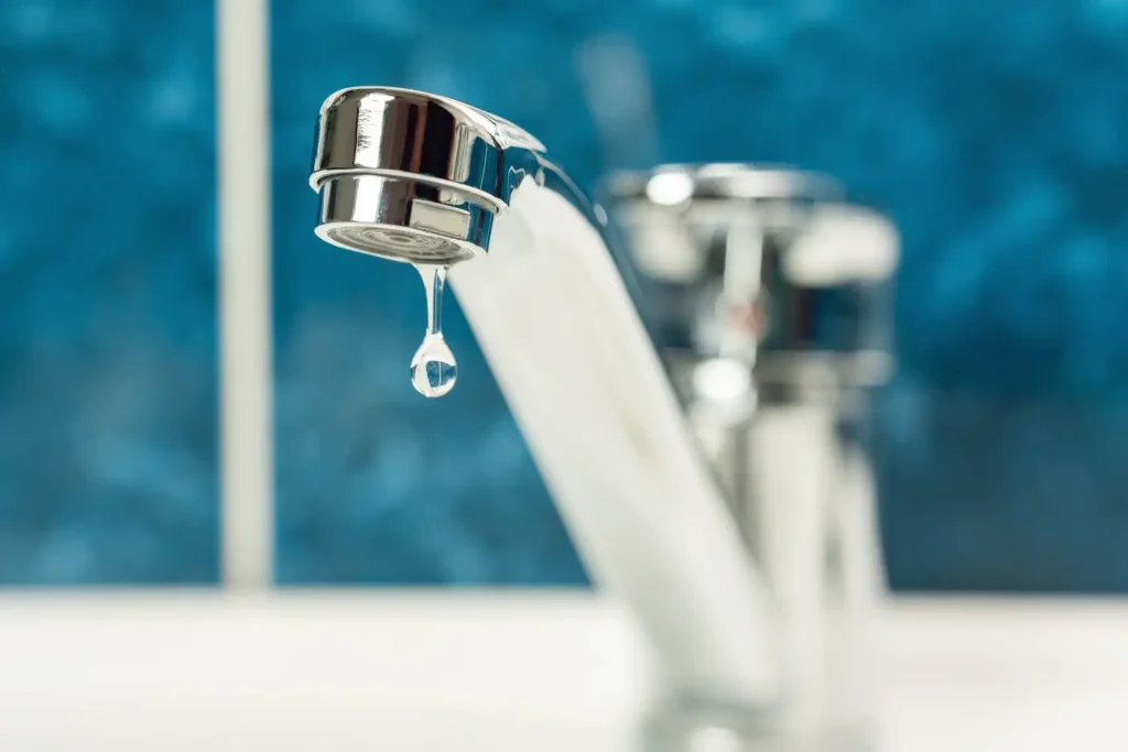 Close-up of leaking faucet