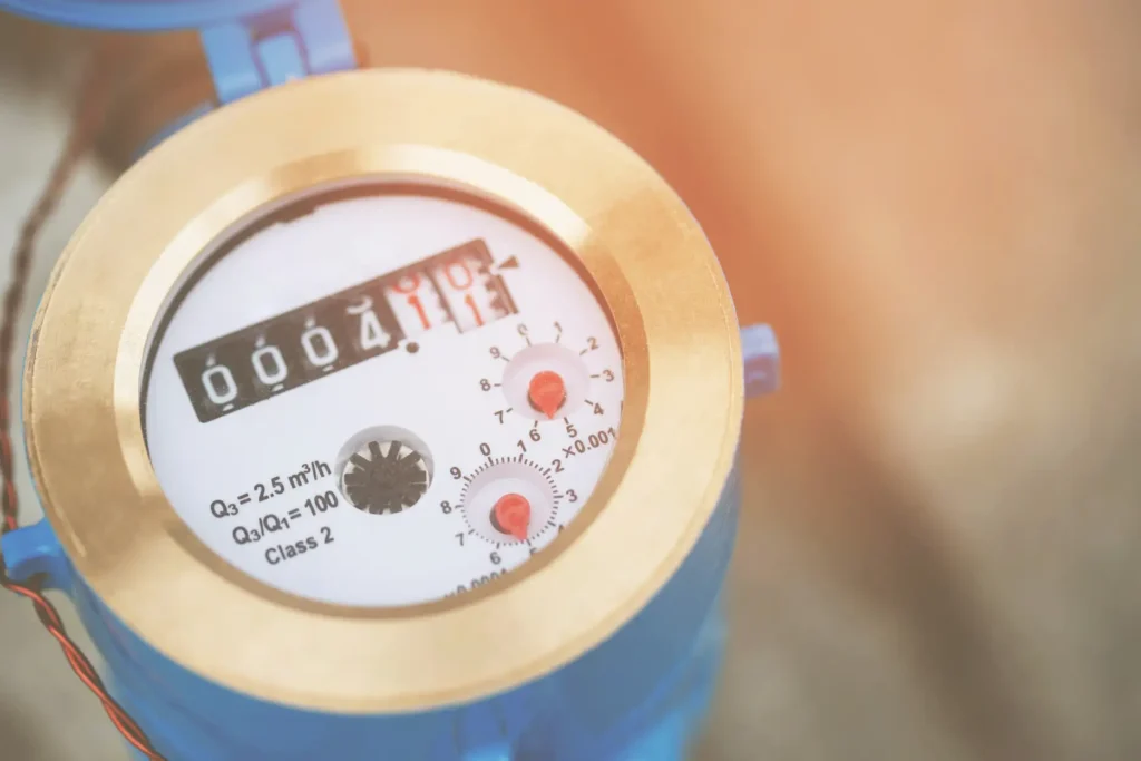 How to read a water meter: close-up view of water meter face showing digital readings