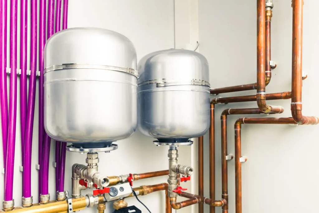 Thermal expansion tank installation with copper pipes for water heater system