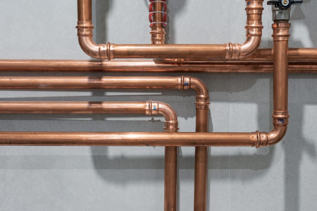 copper plumbing damaged by pinhole leaks