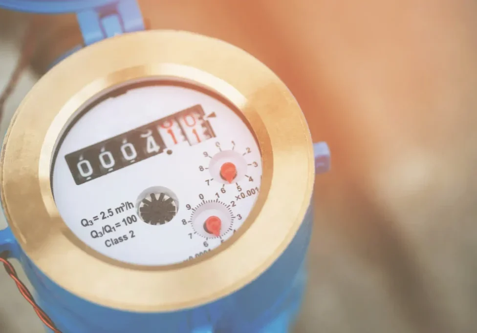 How to read a water meter: close-up view of water meter face showing digital readings